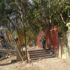 Pedaling up onto the bridge at the start of the Rio Cuale El Paso trail.