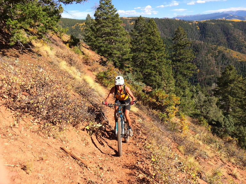 A rider cleans the last technical traverse.