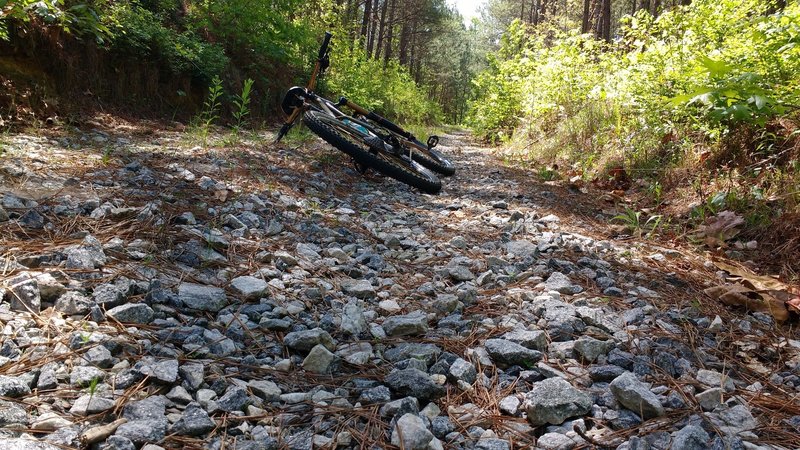 Some of the connecting roads are covered in loose gravel/crusher run. Maintaining traction without spinning out is difficult.