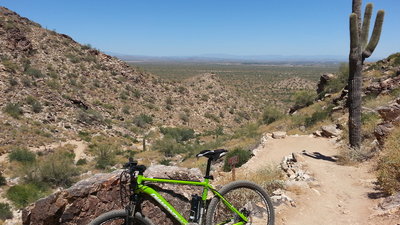 Looking east from the Mesquite Trail, just after the second switchback. The left side shows the first switchback near the bench.