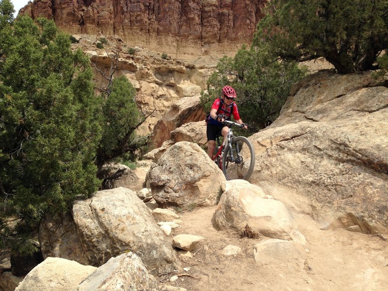 Riding one of the many tech spots on Palisade Rim.