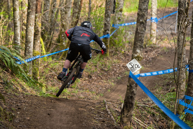 A rider sends the final jump on White Knuckle before speeding into the staging area.