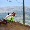 A young racer is highlighted against a surprisingly clear spring background on Muffin Top.