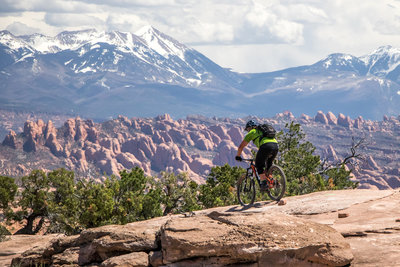Slickrock riding with views into Moab and the Lasals above town.