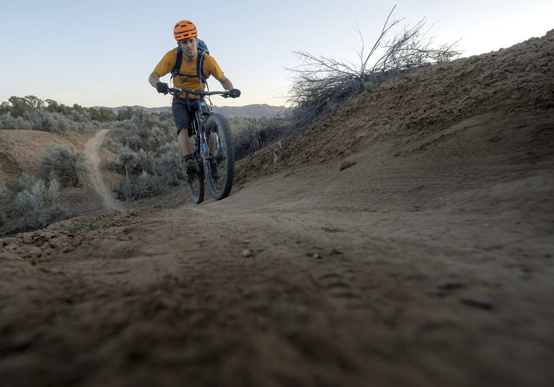 Pedaling up the smooth singletrack at Phil's World on My Ride with Molly.