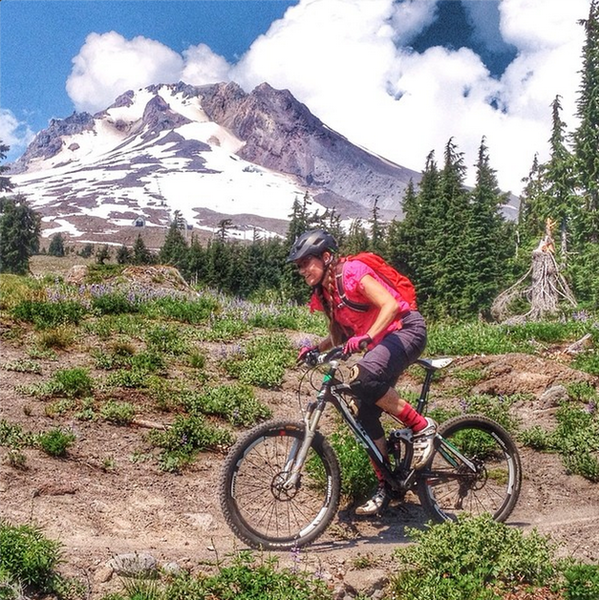 Uma Kleppinger riding below Mt. Hood on the Timberline to Town trail.