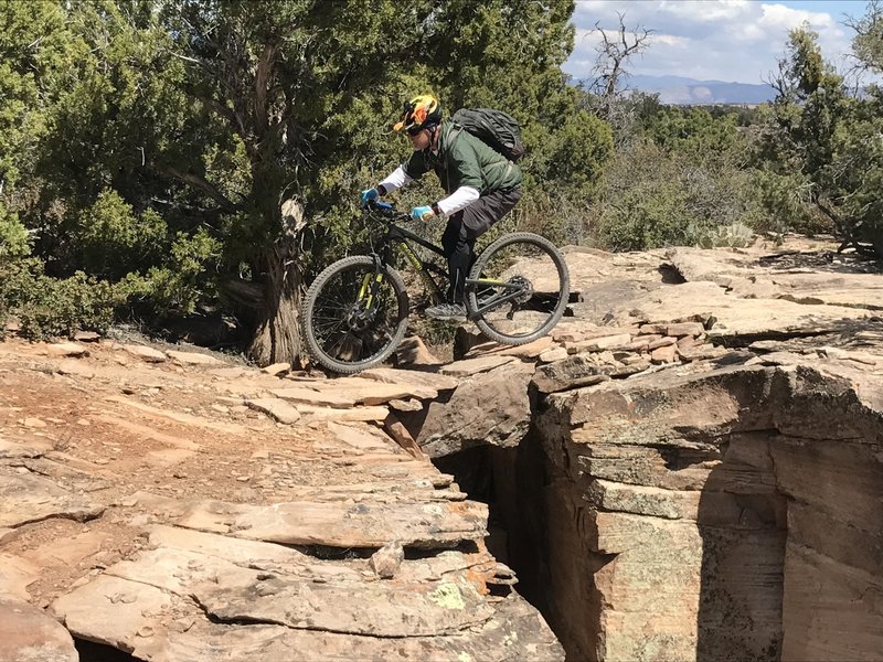 Randy riding a bridge on the North Point Loop.