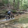 Pedaling up the middle of the creek on the Sheltowee Trace NRT: Section 30.