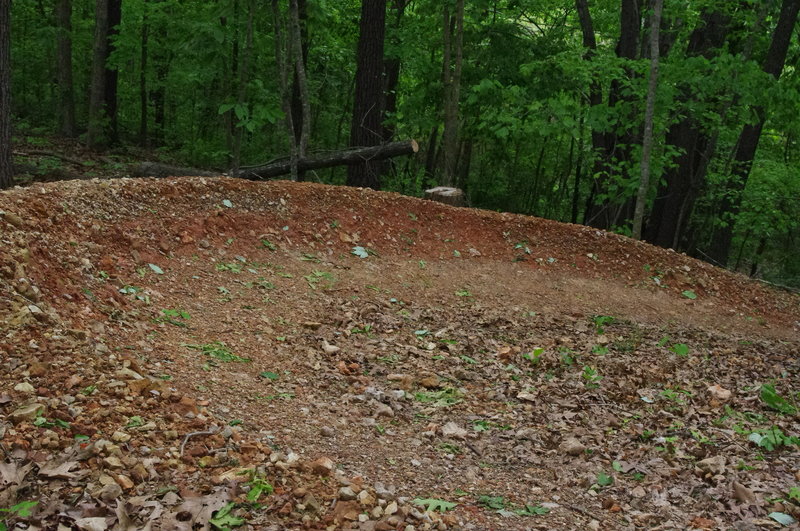 sculpted clay berm on the top section of Flo Ride.