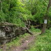 There's lots of big limestone as the trail meets the road.