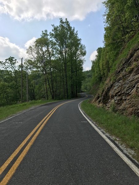 Don't let the pavement fool you. It is all gravel about 100 yards up... and for the next three miles.