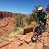 Ashley absolutely loves her new favorite trail as she descends toward the road on Porcupine Rim.