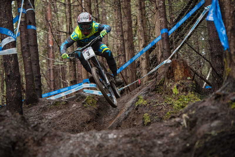 Matt Orlando drops into a slick and muddy chute on Kind Diamond during the Pro GRT and NW Cup.