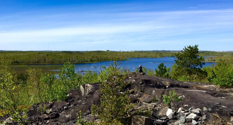 The view across Lake Laurentian makes the rocky climb worth it.