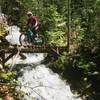 Spring gives this already interesting trail some added flair by crossing over this rushing waterfall.