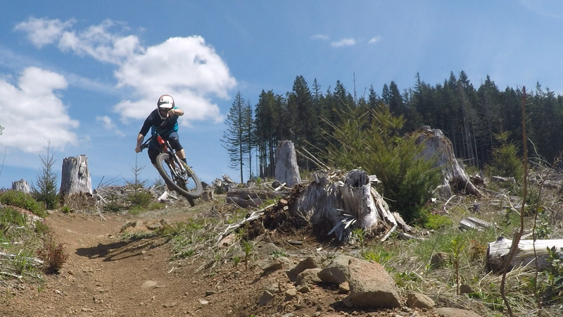 Getting some air on the Cold Creek Trail clear cut.