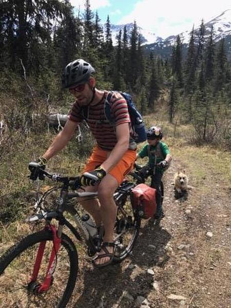 A kiddo and corgi in tow round out the crew.