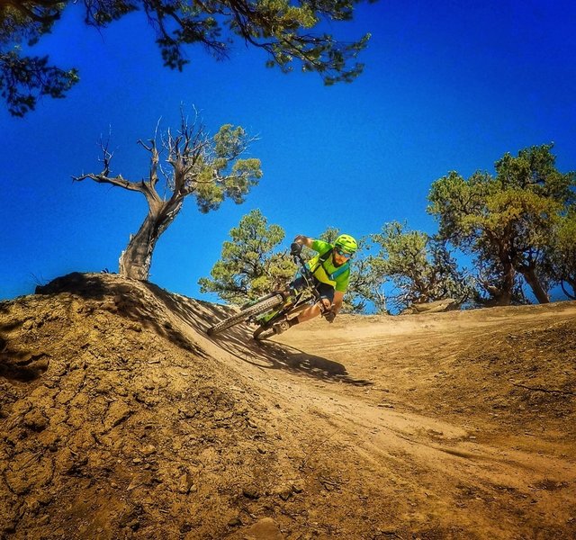 Pushing the edge of grip in the corkscrew.