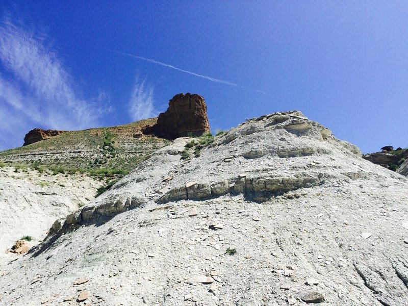 Looking up toward a sandstone outcrop above the trail. Gorgeous high desert views!