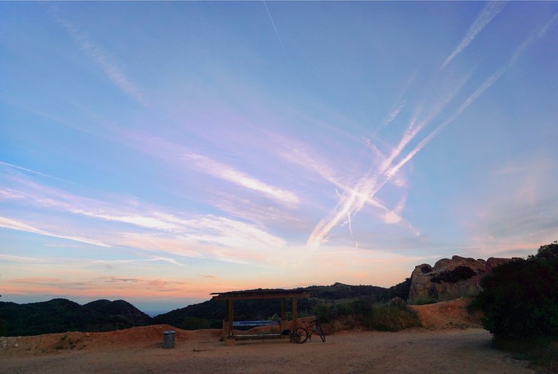 The Hub at dusk. It looks lonely here, but this is the confluence of several trails and roads in the area and a good place to make new friends. Shade, trash, and restroom available, but no water.