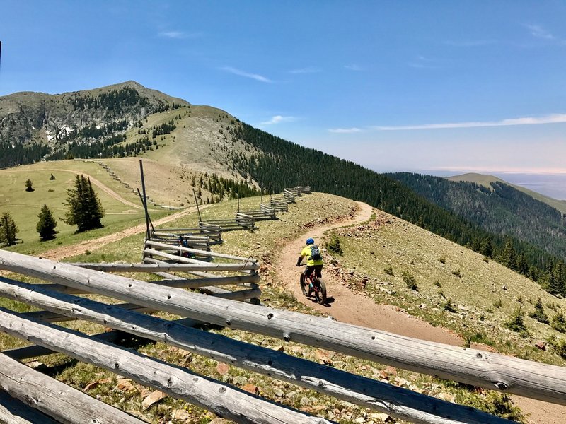 Shredding down the trail near the summit with noteworthy views all the way down!