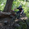 Navigating the gnarly rock garden down Hidden Trail.