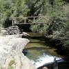 Scoping out the bridge over Cane Creek.