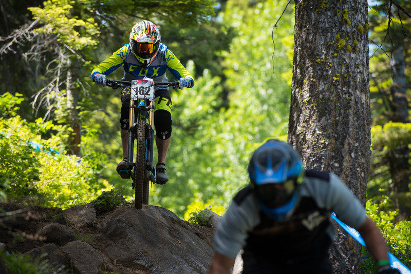 Racers head into the tech on Rock Star during practice for the NW Cup.