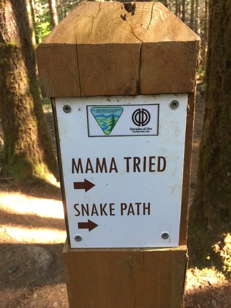 Sign for Mama Tried and Snake Path.