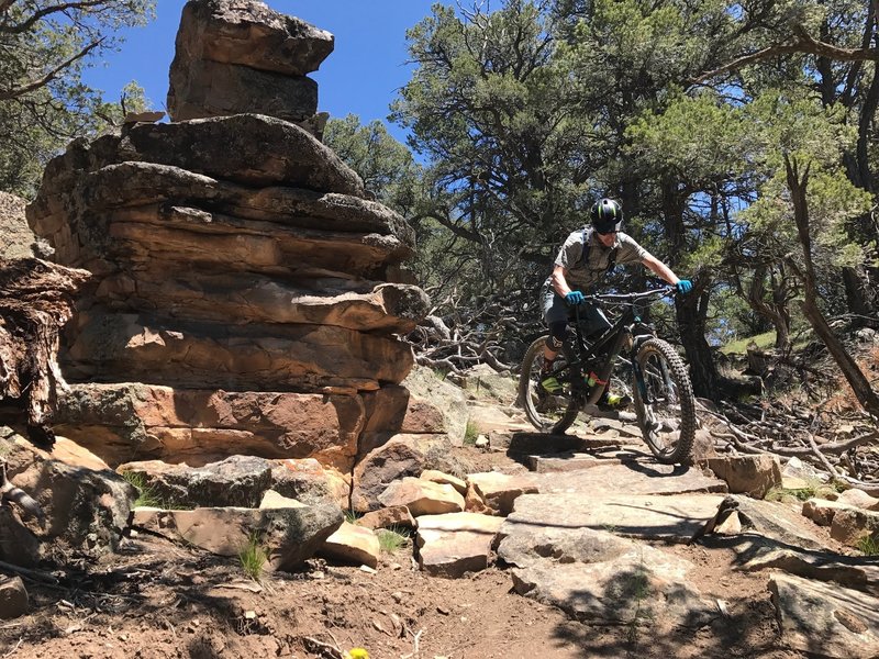 Working around a sharp turn down a rock feature on Exterminator.