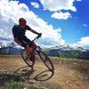 Enjoying the berms on Barney Flow with Breck in the background.