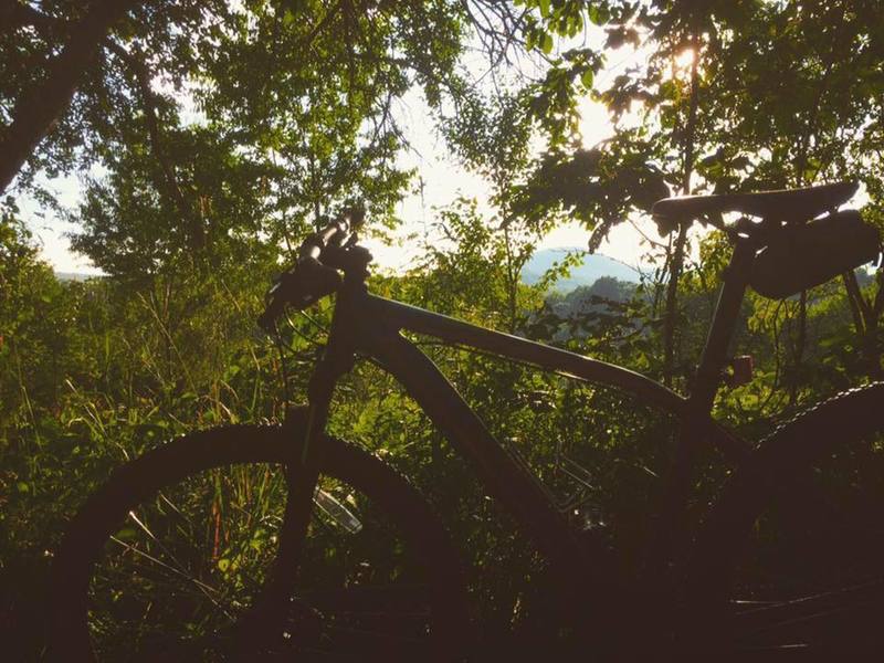 Taking a break on the McCune Trail, Sugarloaf Knob in the background.