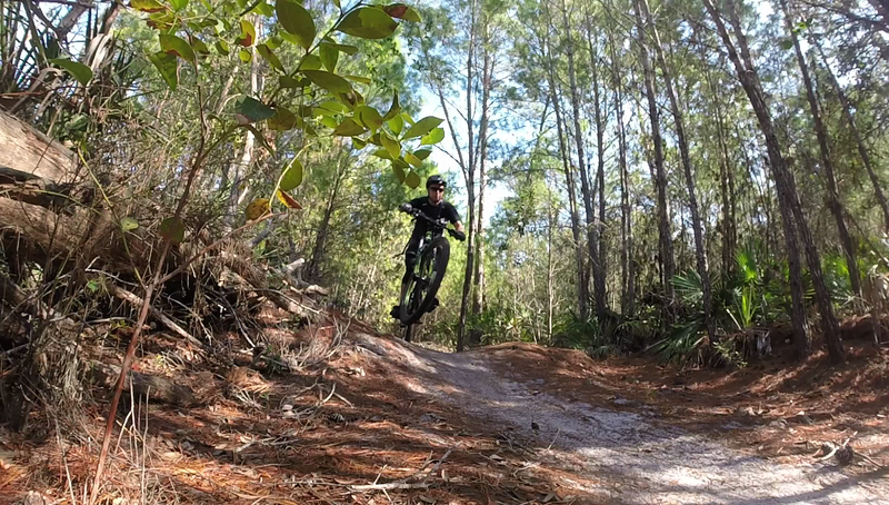 Finding some air  on the Yellow West trail at Turkey Creek.