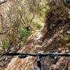 Big boulders, steep shoulders, and plenty of shade on an eastern section of Gabrielino Trail NRT