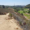 Great trail borders the fence near the golf course.