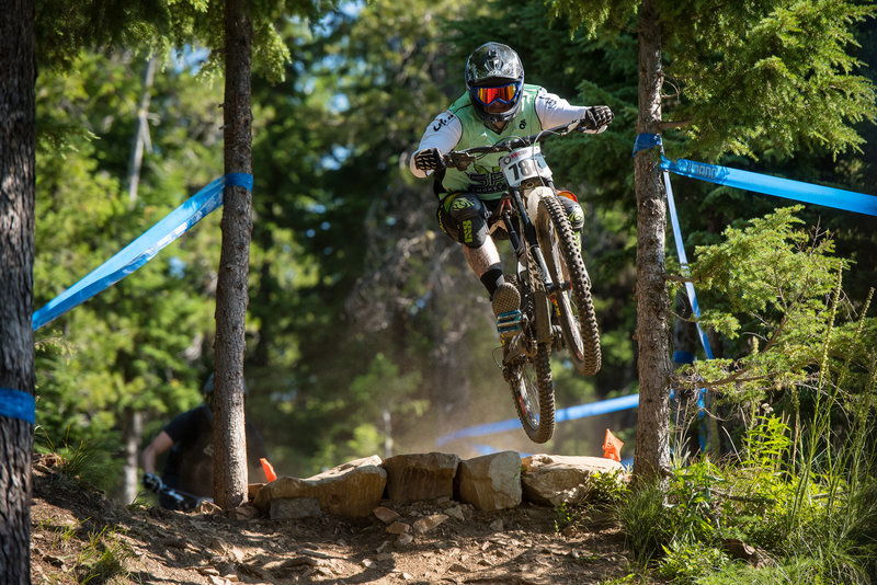 Goal! A rider drops through the goal post trees on the first drop.