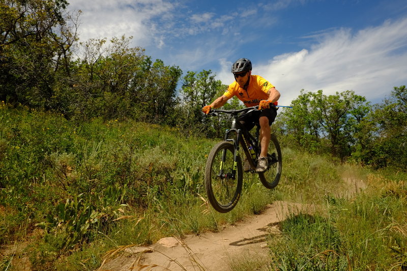 A local trail ambassador catches some air on NPR. Photo: Dave Epperson