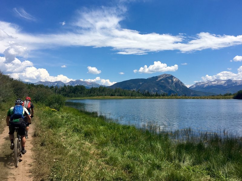 Skirting by Williams Creek Lake on the narrow doubletrack of the Raggeds Trail.