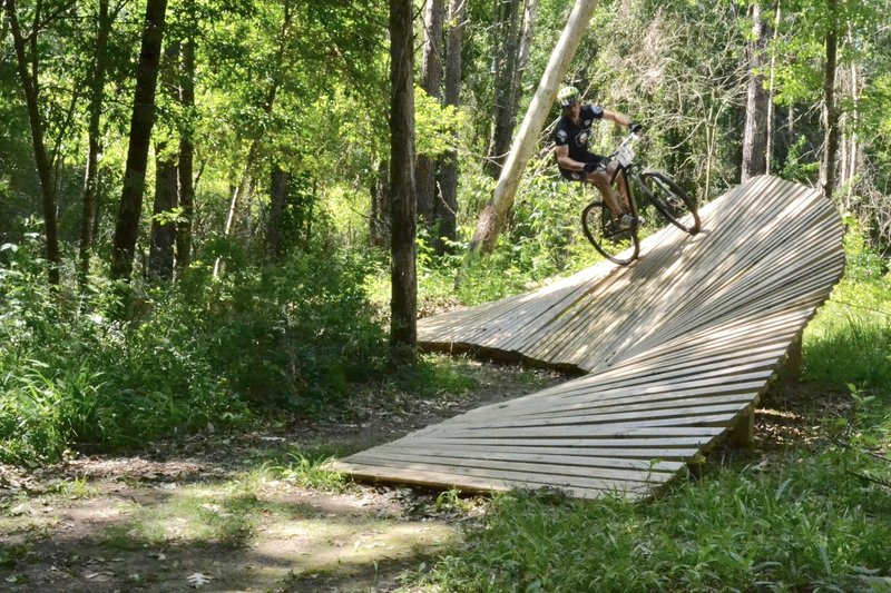 Carly Cagle photographs a racer on the new Talladega bank turn during the 2017 Dust N Bones race.