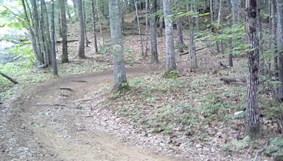 The Cross Topsham Trail as it switchbacks its way up a hill near Foreside Road.