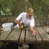 Johnny Hart repairs last board to reopen the Soggy Bottom bridge.  It was under 4-5' of water last week after we received over 12" of rain in 24 hours.