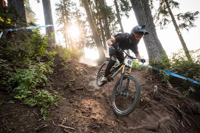 Kasper Dean charges down the rooty waterfall on Berserker.