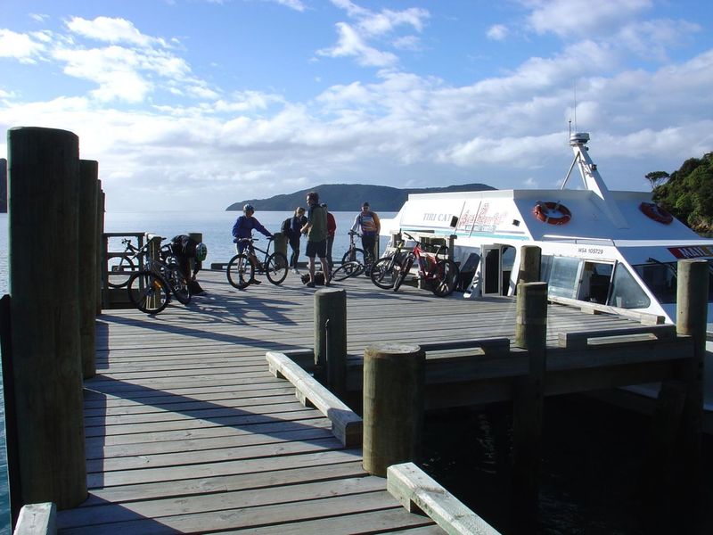 Unloading bikes off the water taxi at Ships Cove