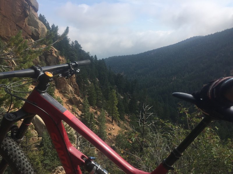 Very end of Bear Creek Trail, waterfall to the left, canyon to the right. Nice place to rest after a hard climb!