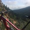 Very end of Bear Creek Trail, waterfall to the left, canyon to the right. Nice place to rest after a hard climb!