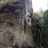 An interesting rock with a bench. About 4 miles into the trail from the Black Road entrance.