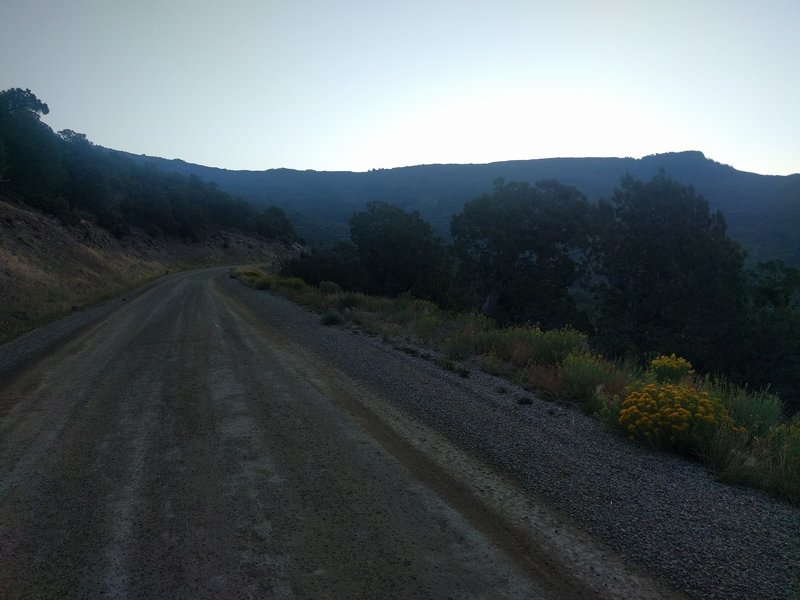 So, as you ride up the Mesa, this is pretty much what it looks like the entire way. It's a long, sustained climb at an achievable yet challenging grade. Turning around, one sees the shadow the Mesa cast over the earth.