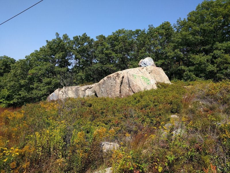 The iconic Lynn Woods boulder. People actually ride up and down this boulder block.