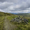 This pile of rocks signals that the Glen Finglas climb is over and you'll have a commanding view of Loch Lemond & Trossachs National Park.