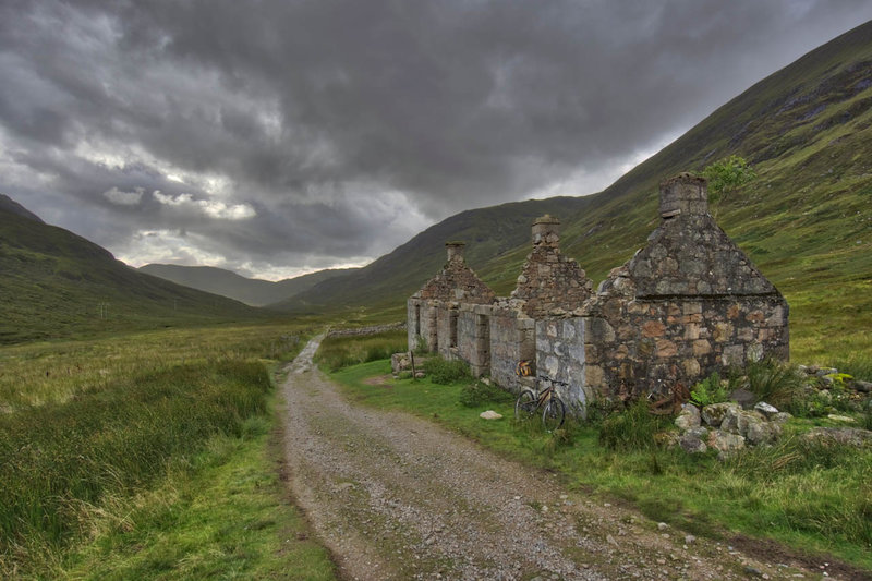 A trailside ruin offers no roof to shelter from the coming rain.